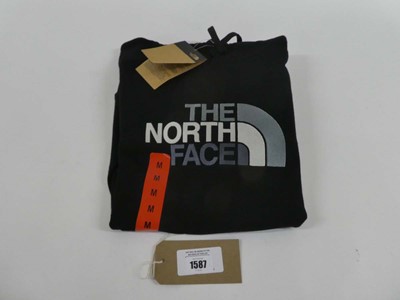 Lot 1587 - The North Face hooded jumper in black size medium