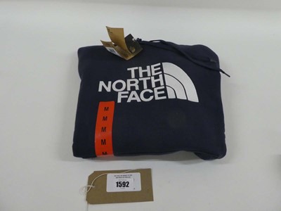 Lot 1592 - The North Face hooded jumper in navy size medium