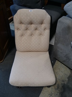 Lot 1161 - Pink button back upholstered nursing chair on...