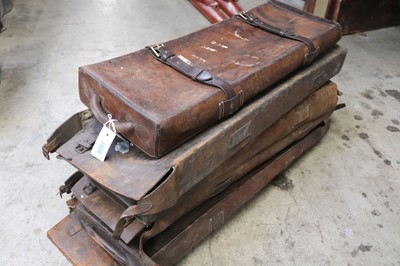 Lot 1406 - Six leather gun case outers