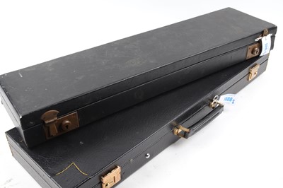 Lot 1408 - Two black vinyl gun cases, each fitted for 28...