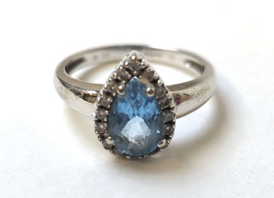 Lot 501 - A 9ct white gold, topaz and diamond pear...