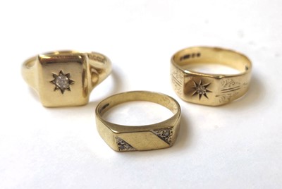 Lot 509 - Three 9ct gold and diamond set signet rings....