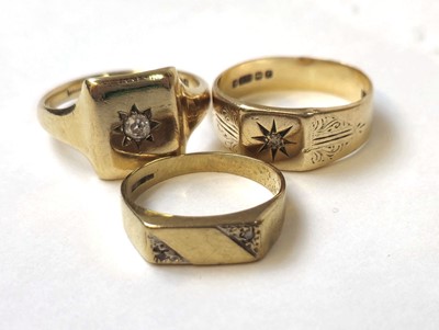 Lot 509 - Three 9ct gold and diamond set signet rings....