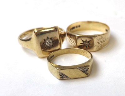 Lot 509 - Three 9ct gold and diamond set signet rings....