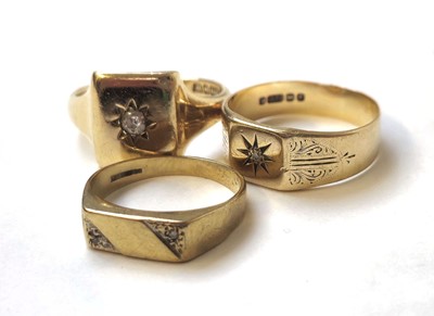 Lot 509 - Three 9ct gold and diamond set signet rings....