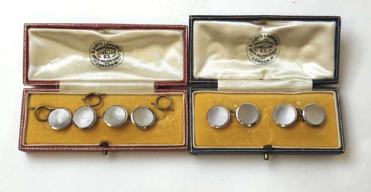 Lot 525 - A boxed pair of cufflinks marked '9ct & pt'...