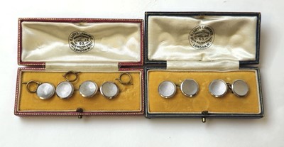 Lot 525 - A boxed pair of cufflinks marked '9ct & pt'...