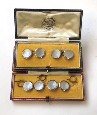 Lot 525 - A boxed pair of cufflinks marked '9ct & pt'...