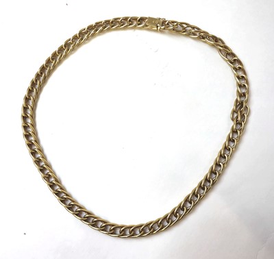 Lot 528 - A 9ct gold curb link chain. Approx. weight...