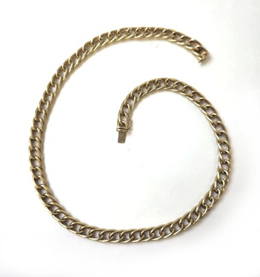 Lot 528 - A 9ct gold curb link chain. Approx. weight...