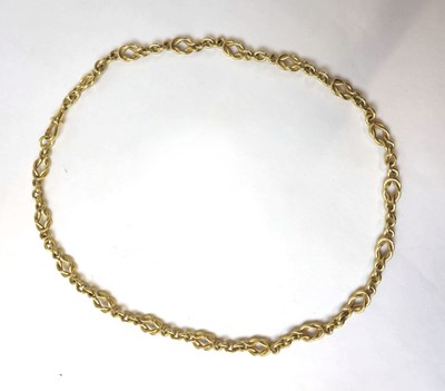 Lot 529 - An 18ct gold knot link chain. Approx. weight...