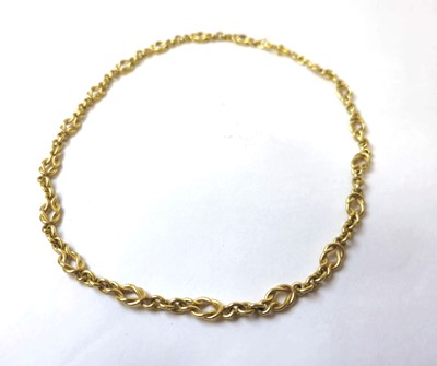 Lot 529 - An 18ct gold knot link chain. Approx. weight...