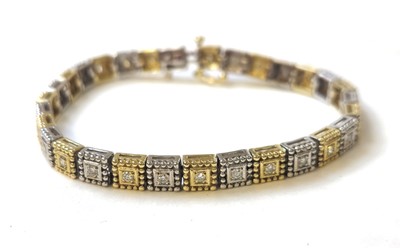 Lot 532 - A yellow and white metal diamond set tennis...