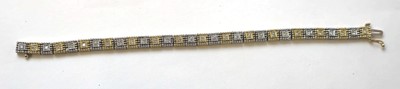 Lot 532 - A yellow and white metal diamond set tennis...