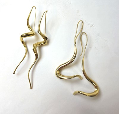 Lot 535 - Two oversized yellow metal earrings marked...