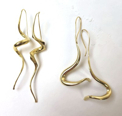 Lot 535 - Two oversized yellow metal earrings marked...