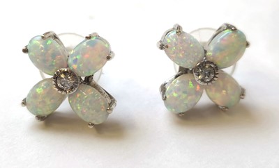 Lot 544 - A pair of white metal, opal and white stone...