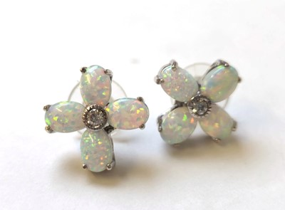 Lot 544 - A pair of white metal, opal and white stone...