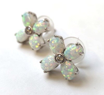 Lot 544 - A pair of white metal, opal and white stone...