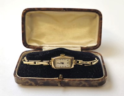 Lot 564 - A ladies 9ct gold cased wristwatch on an...