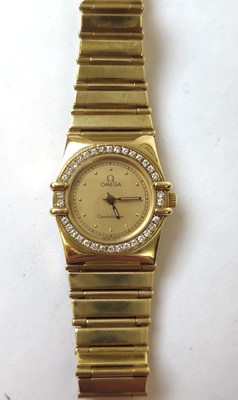 Lot 571 - A ladies 18ct gold Omega constellation...