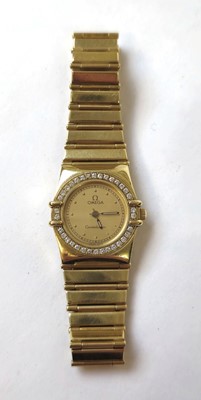 Lot 571 - A ladies 18ct gold Omega constellation...