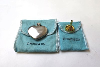 Lot 552 - A Tiffany & Co. white metal heart shaped scent...