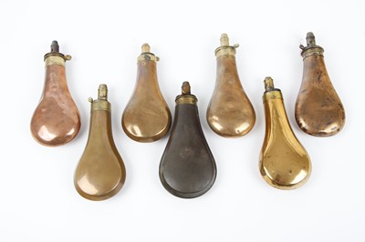 Lot 2 - Seven various copper and brass bag shaped...