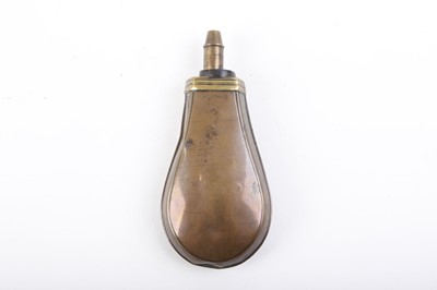 Lot 48 - Copper and brass powder flask with rope net...