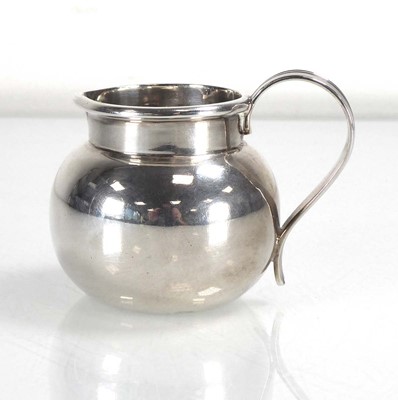 Lot 454 - An early 20th century silver cream jug of...