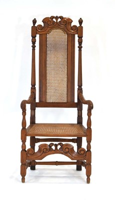 Lot 19 - A highback hall chair in the late 17th century...