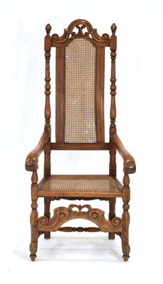 Lot 20 - A highback hall chair in the late 17th century...