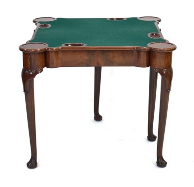 Lot 27 - A George II mahogany card table, the folding...