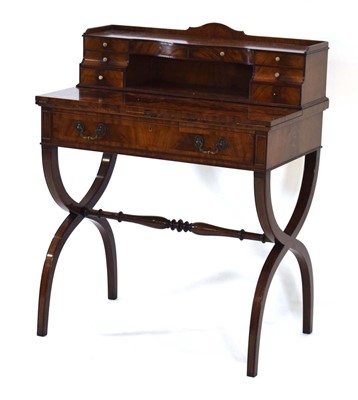 Lot 51 - A Regency-style mahogany and crossbanded...