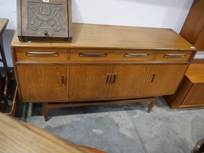 Lot 1013 - Mid century teak side board with 3 upper drawers