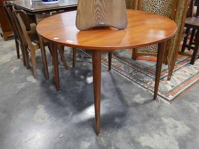 Lot 1021 - Mid century teak circular extending dining...