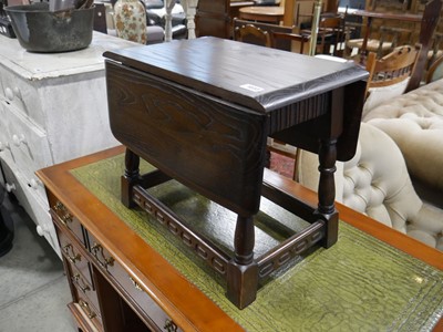 Lot 1033 - Dark oak finish drop side coffee table