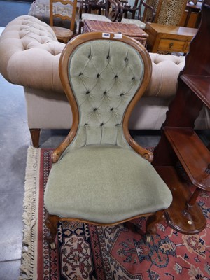 Lot 1040 - Mahogany framed green button back upholstered...