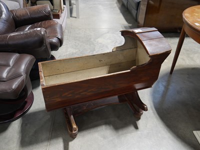 Lot 1052 - Early 20th century wooden rocking crib