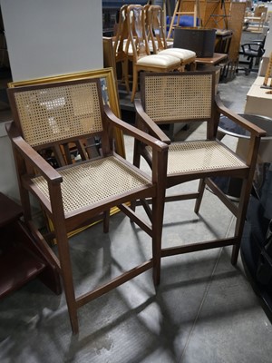 Lot 1058 - 2 bar height wooden framed stools with cane...