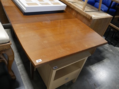 Lot 1077 - Mid century teak extending dining table Made...