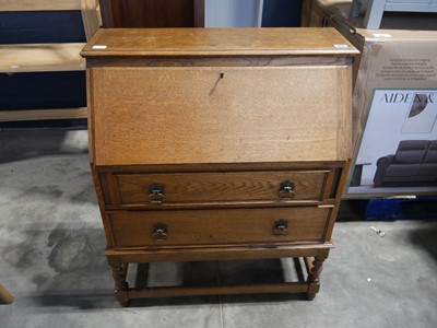 Lot 1091 - Dark oak 2 drawer writing bureau