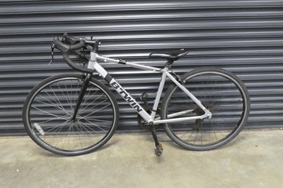 Lot 2005 - B Twin Triban 100 racing bike in silver and black