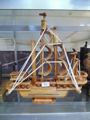 Lot 321 - A hand built wooden model of a galleon