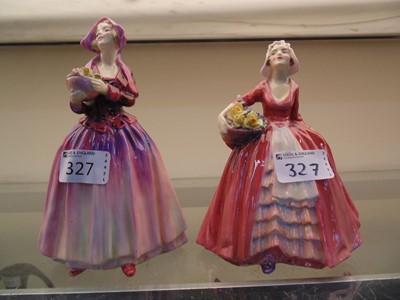 Lot 327 - Two Royal Doulton ceramic figurines 'Dorcas'...