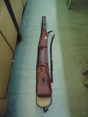 Lot 338 - A brown leather gun case