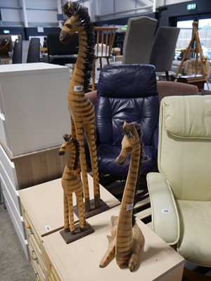 Lot 1127 - 3 wooden giraffe sculptures