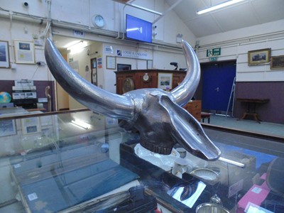 Lot 352 - A cast aluminium model of a bull's skull