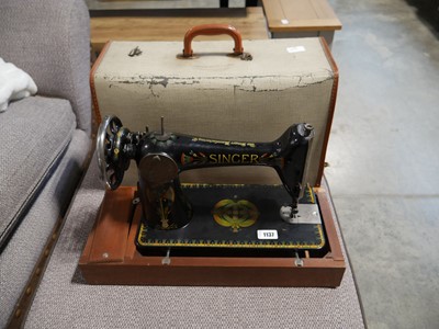 Lot 1137 - Manually operated Singer sewing machine in...